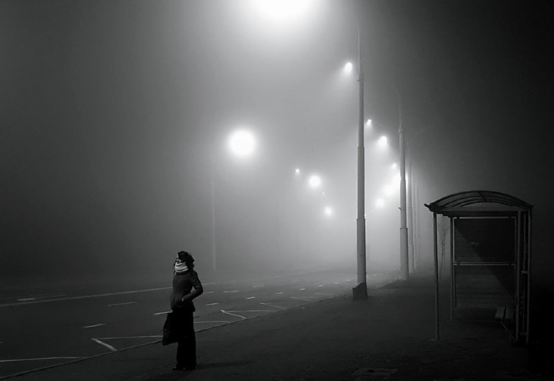 woman waiting in fog